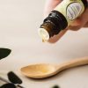houten lepel vitamine druppels